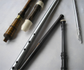 Various musical tubes scattered in an artfully random style